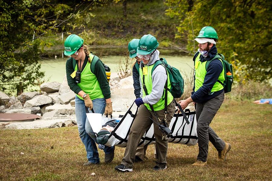 A team of first responders transports a victim to a treatment center during Missouri Hope. (Photo by Lauren Adams/Northwest Missouri State University)